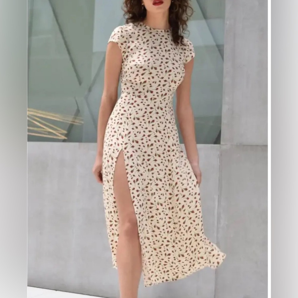 Reformation NWOT white dress with rose print. Backless keyholes